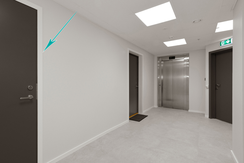 Ute i fellesområdet er det kort veg til heisen. 